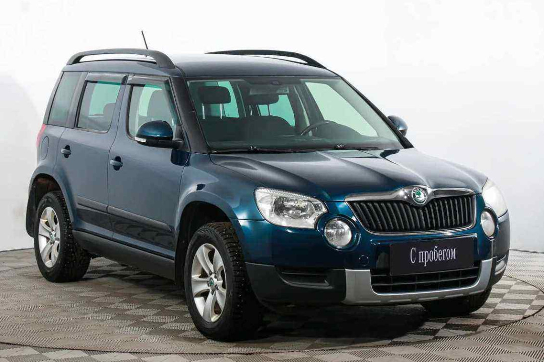 Шкода йети 2012 1.2. Skoda Yeti 2012. Шкода Йети 2012 салон. Шкода Йети 2012 год палитра цветов. Skoda Yeti 2012 багажник.